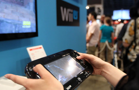 The Wii U machine features a 6.2-inch touch-screen controller that lets users wirelessly connect to the console and shift the display between a TV and the device.