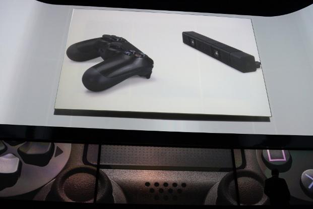 The game controller shown on the screen as Sony introduced the PlayStation 4 at a news conference 20 February in New York. Photo: AFP